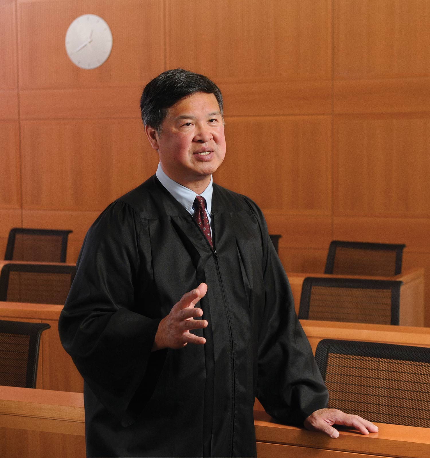 portrait of Denny Chin in a courtroom wearing robes