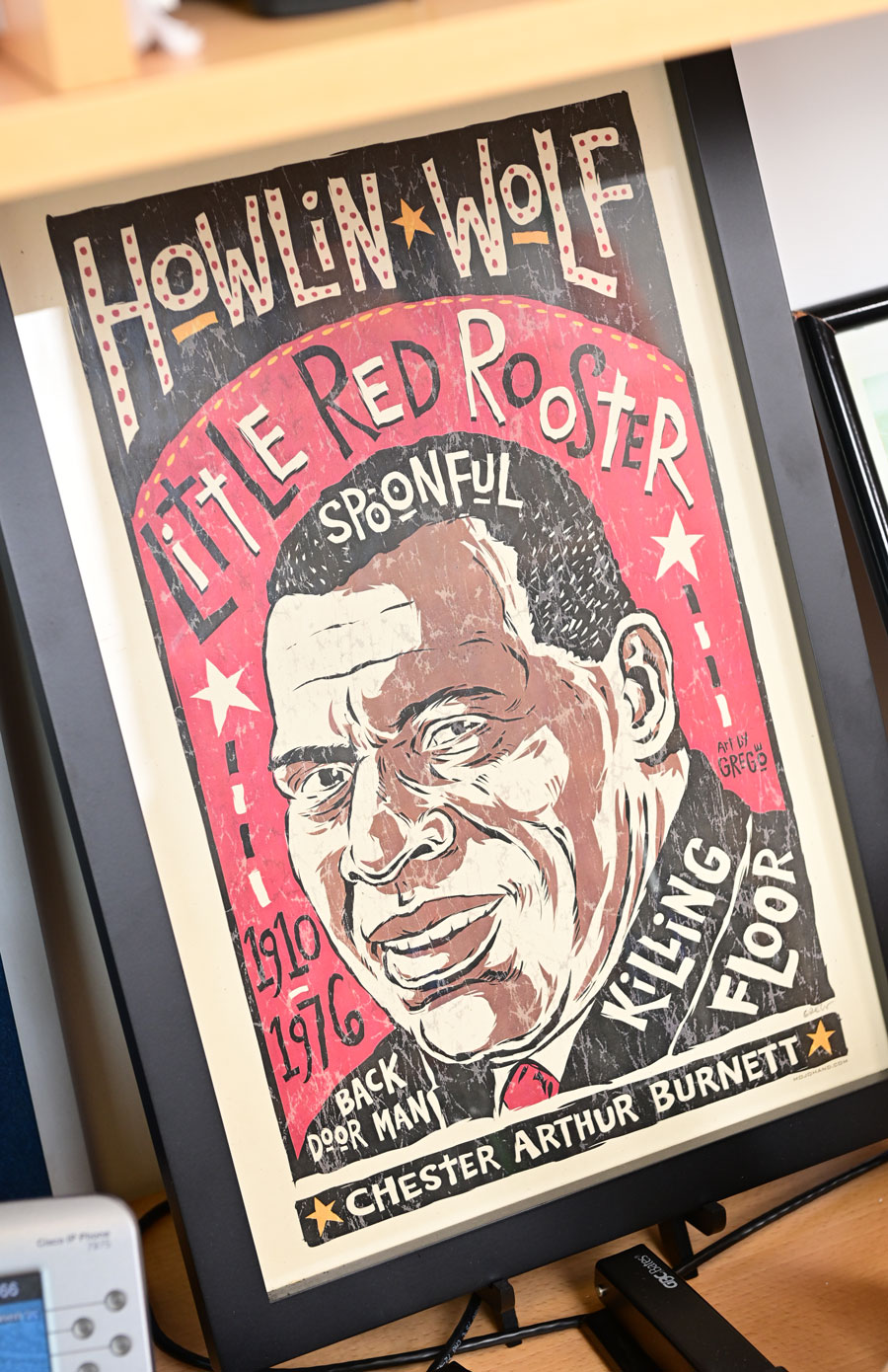 Framed poster of the blues artist who went by Howling Wolf