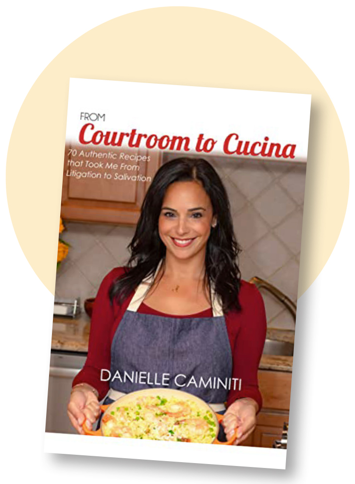 From Courtroom to Cucina cookbook cover photograph of Danielle Caminiti smiling