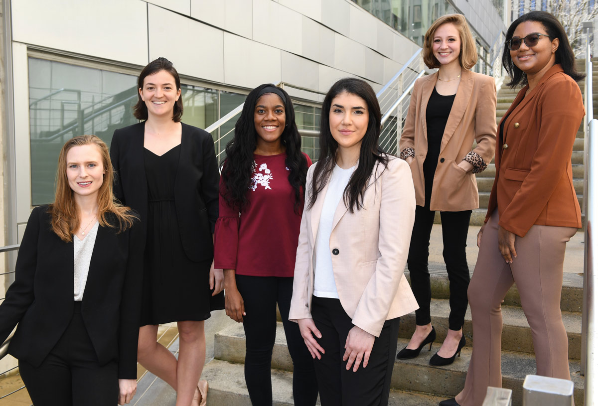 six Fordham Law female students posing for a picture together