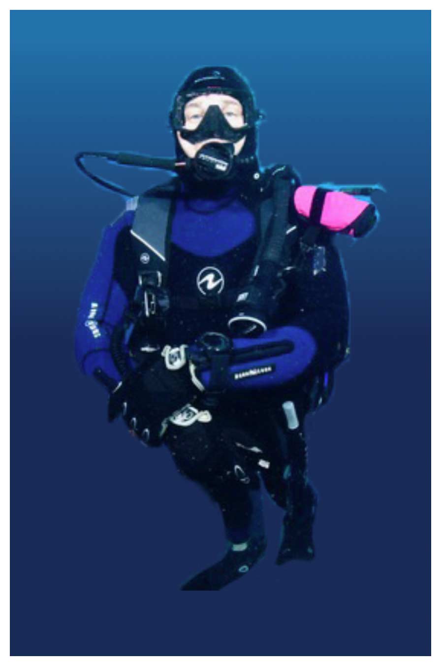 A close-up portrait photograph perspective of Steven Constantiner posing for a picture in his scuba diving outfit