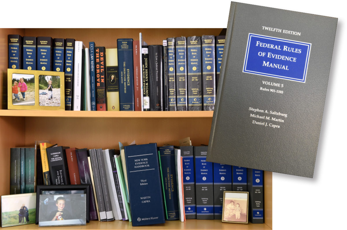 Books on shelf and 'Federal Rules of Evidence Manual'