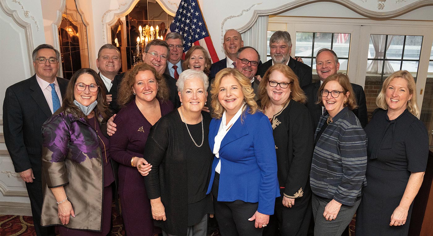 a group photo of D.A. Donnelly with family and friends at her inauguration