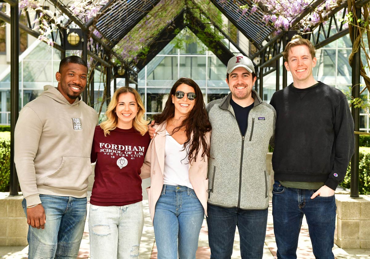 five Fordham students posing for a group photo