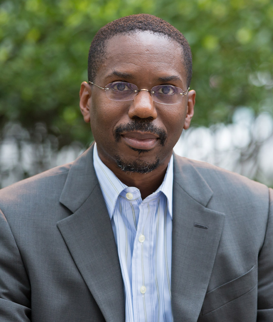 headshot of Bennett Capers
